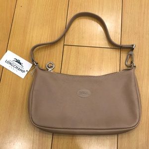 Tan colored Longchamp shoulder bag